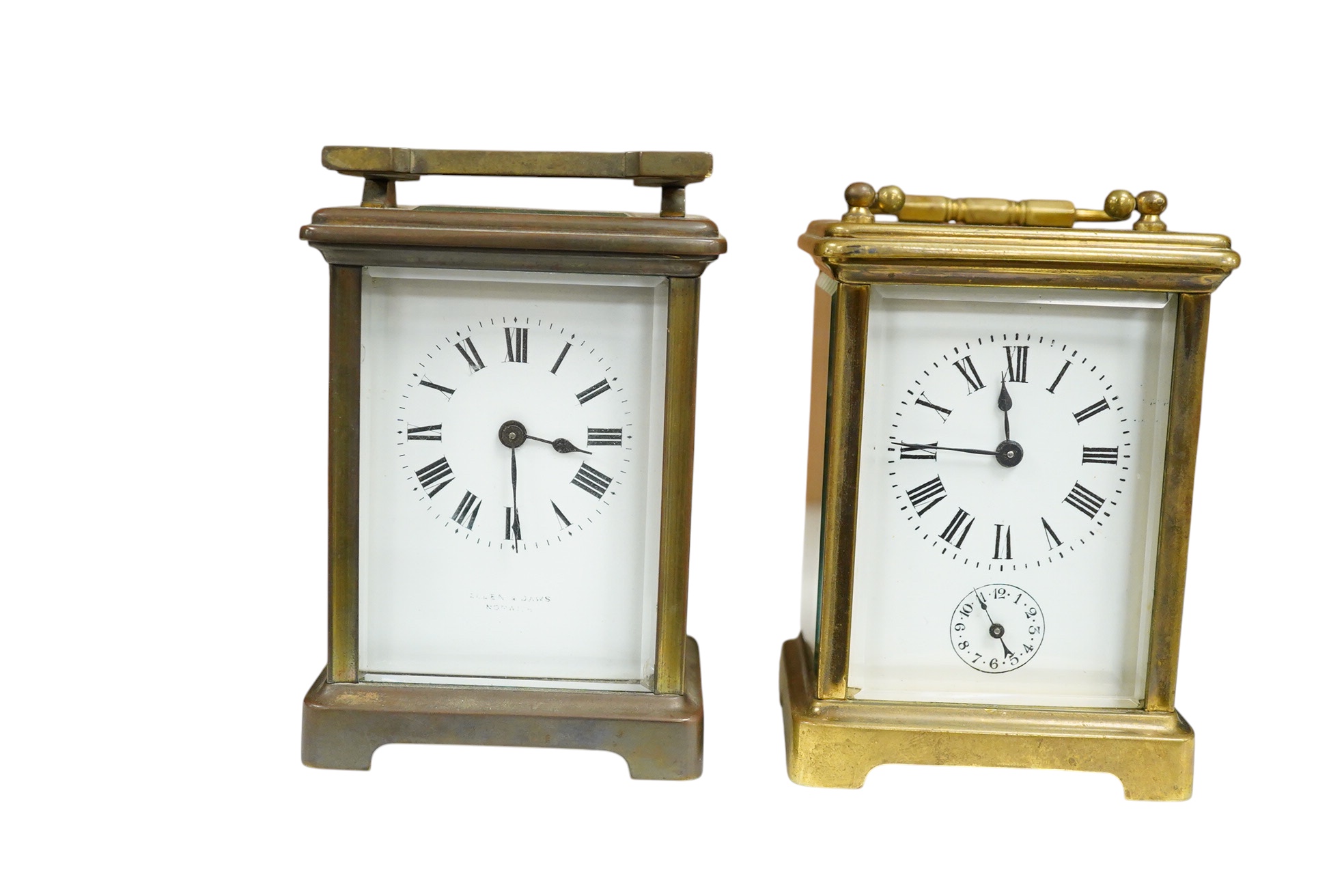 A brass carriage timepiece with alarm and one other, one with key, largest 15cm high